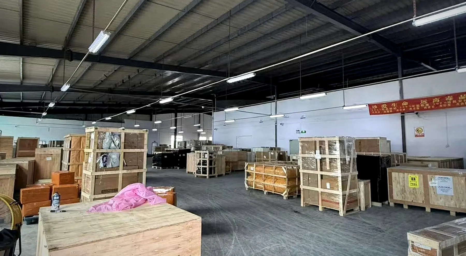 Wooden shipping crates stored in the Buildcargo Logistics operating warehouse in Shenzhen.