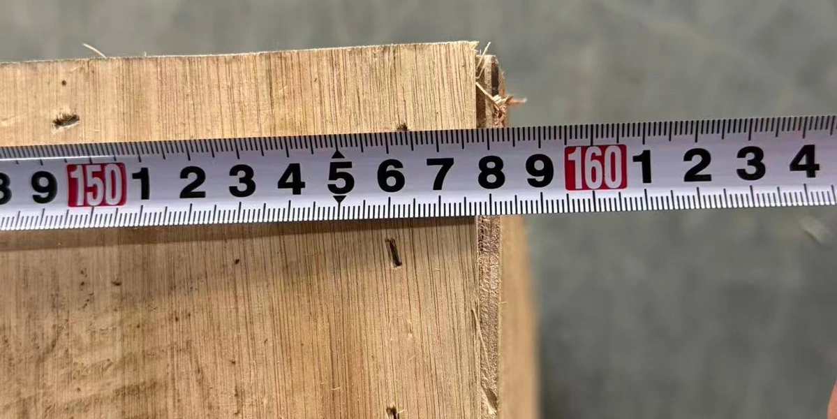Tape measure beside a wooden crate in the separately published Poland quotation record; the document records its length as 158 cm.